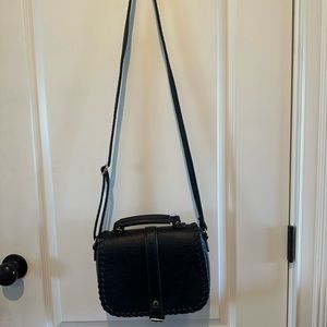 Women’s Gusacci bag.